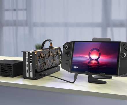 TREBLEET Thunderbolt 3 Mini eGPU Enclosure with a graphics card and a PSU installed connected to a Lenovo Legion GO.