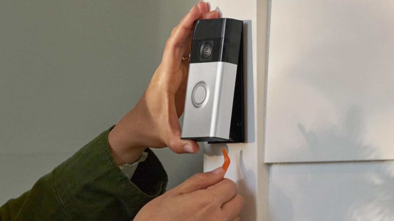 Removing a Ring video doorbell.