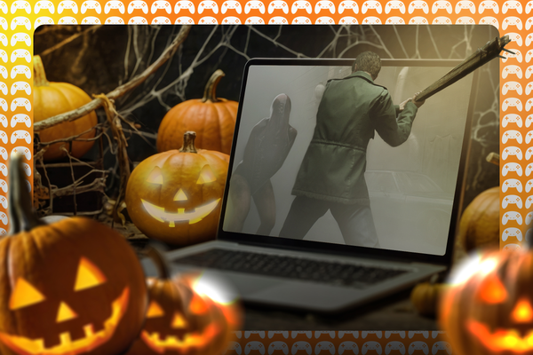 A laptop running a horror game on a table surrounded by Halloween pumpkins.