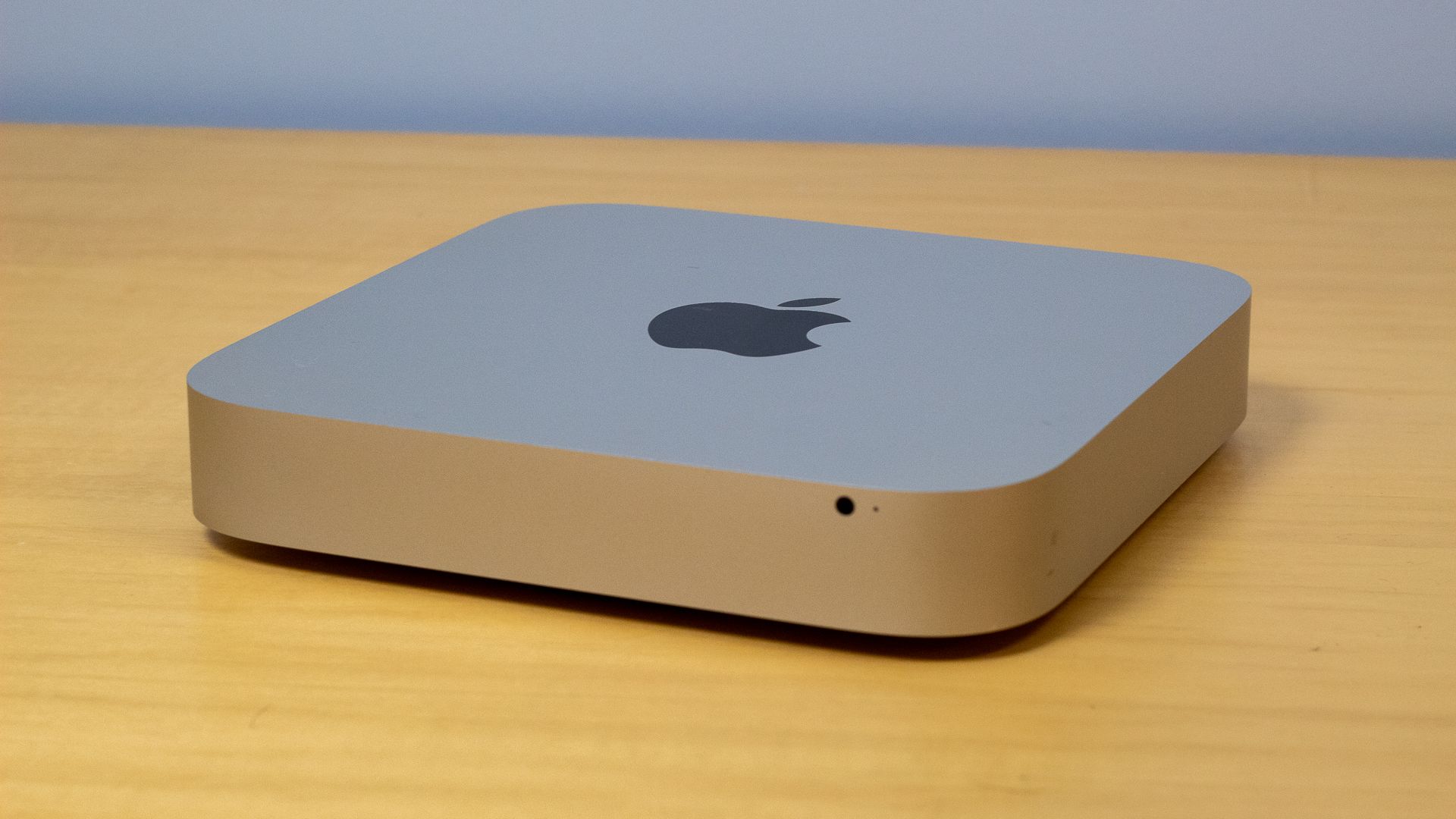 Apple Mac Mini sitting on a table.