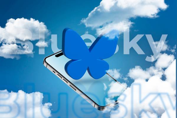 A phone in the clouds with the Bluesky logo.