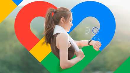 A woman after a run looking at her smartwatch with the Google Fit logo in the center.