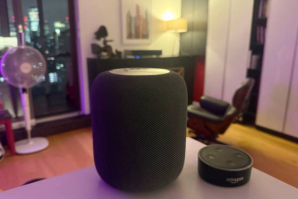 Apple HomePod and Amazo Echo smart speakers.