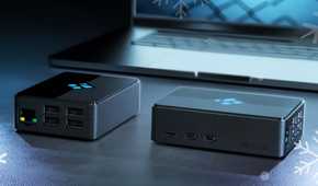 Kodi Limited Edition Raspberry Pi Case next to each other near a laptop.