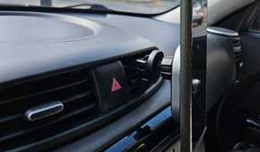 Satechi Qi2 Car Charger Holding Phone