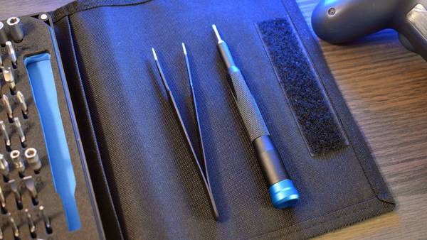 iFixit Pro Tech Toolkit's driver and tweezers.