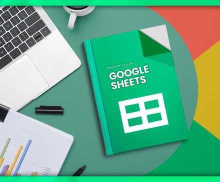 A desk with a laptop, a sheet with some graphs, and a book with the Google Sheets logo.