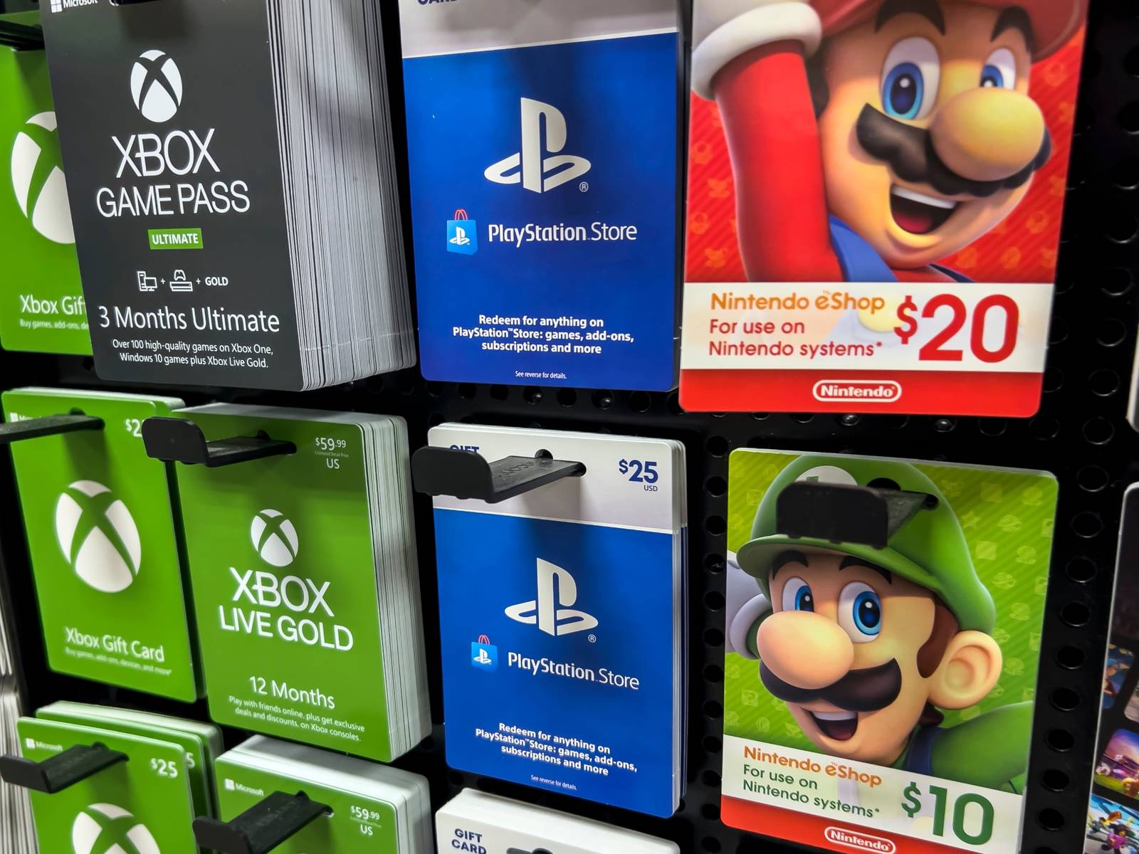 gift-cards-for-xbox-playstation-and-nintendo-platforms-on-a-stand.jpg?fit=crop&h=1200&w=1600