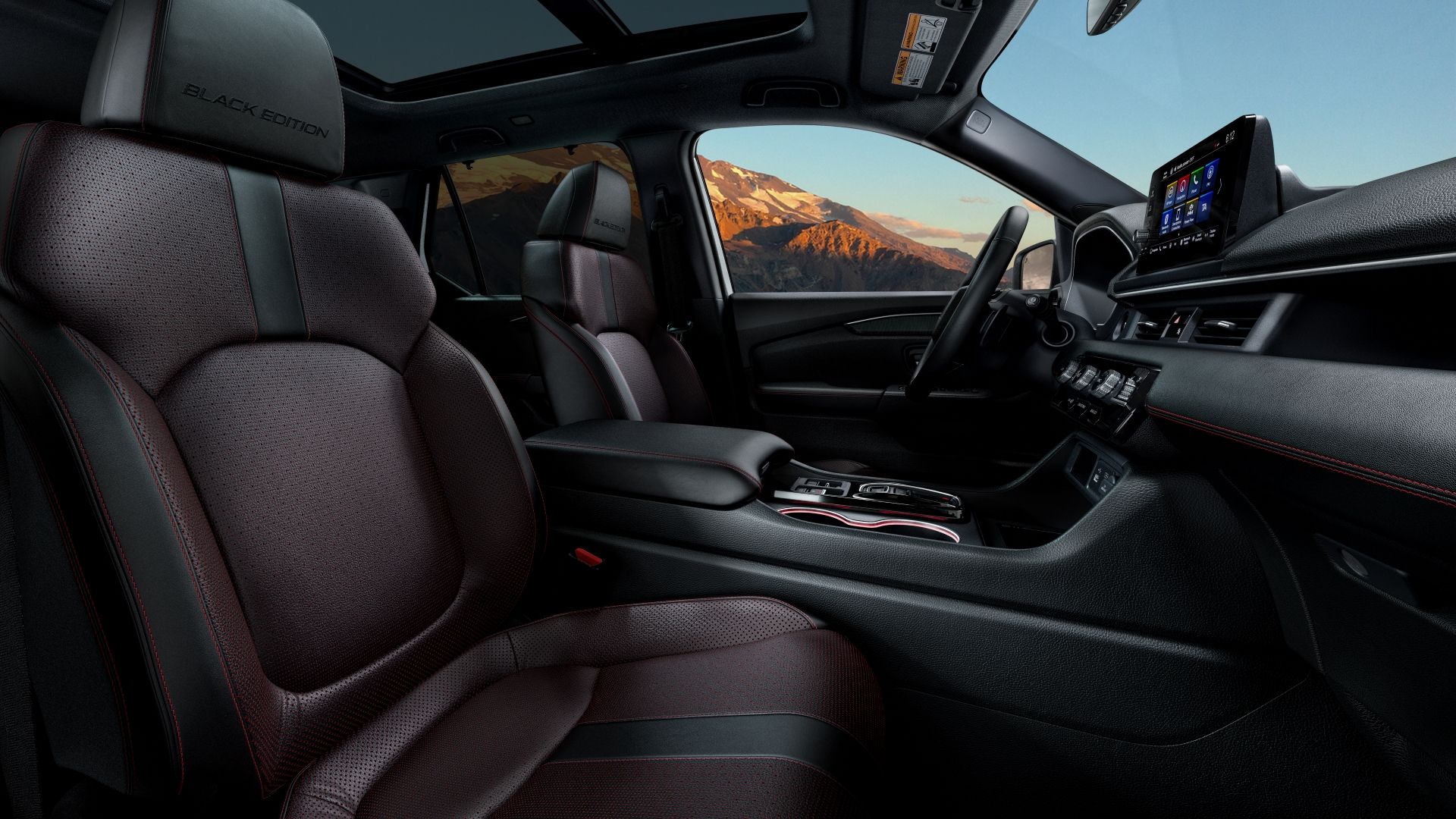Foto do interior da primeira fila em um Honda Pilot Black Edition 2025