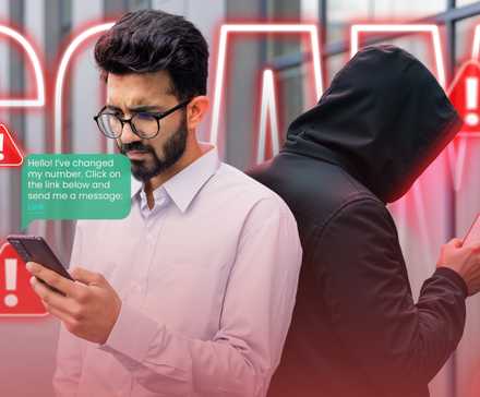 The Most Overlooked Way to Stop Spam Calls on Android and iPhone 2 A man receiving a message on his phone with a scammer behind him and warning signs around.