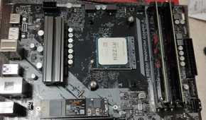 A Ryzen 5 5600X CPU inside a B550M motherboard with some DDR4 RAM and an NVMe SSD.