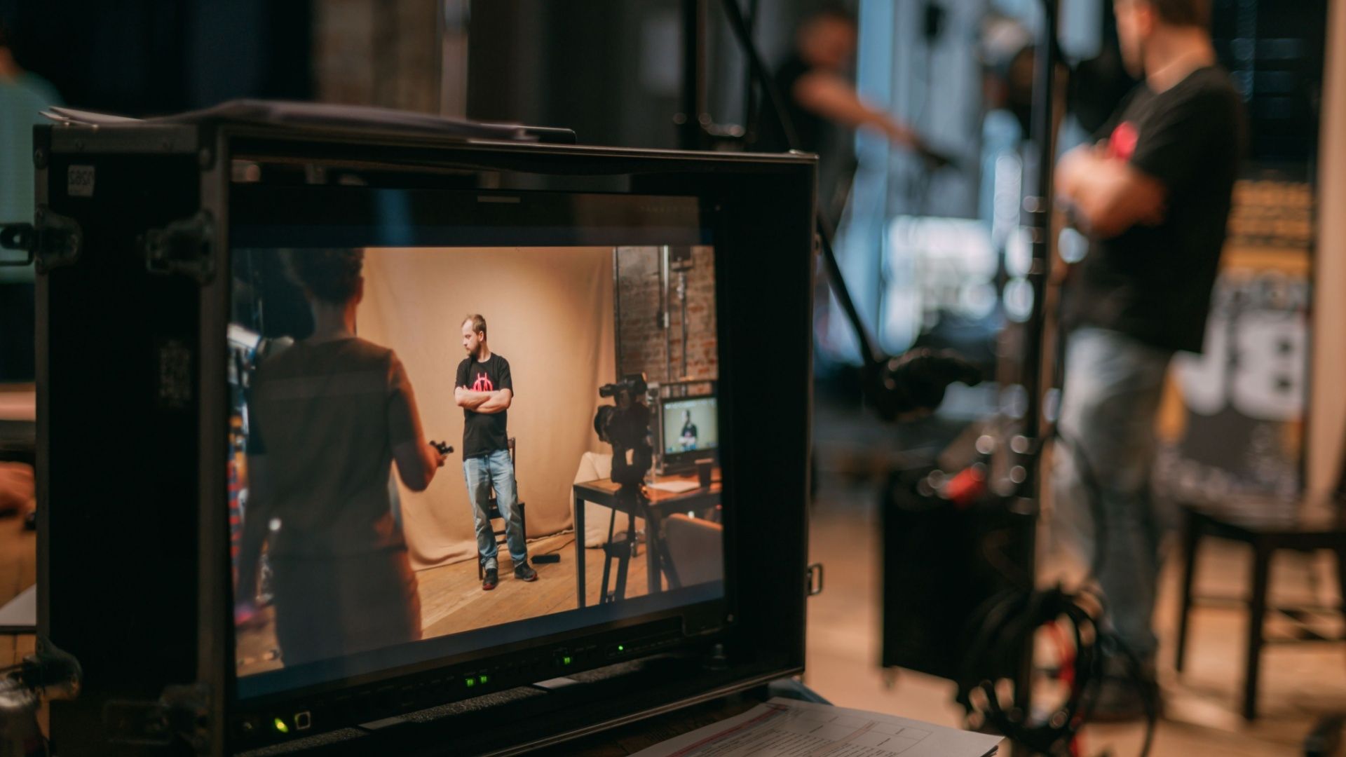 Movie sets, monitors, and the latest filming equipment.