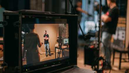 Movie sets, monitors, and the latest filming equipment.
