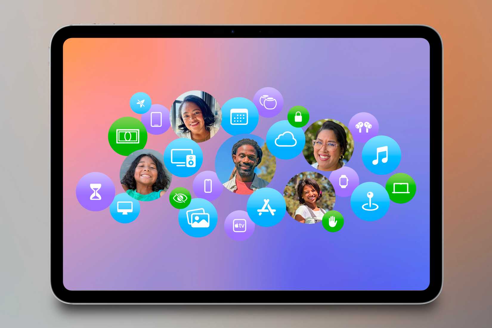 Family Sharing icons showcased on an iPad in front of a colorful background.