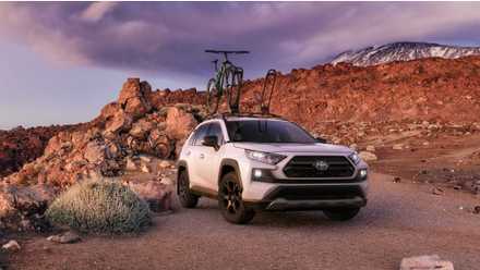 The used BMW SUV that makes new crossovers really feel overpriced White 2020 Toyota RAV4 off-roading with a bicycle on its roof.