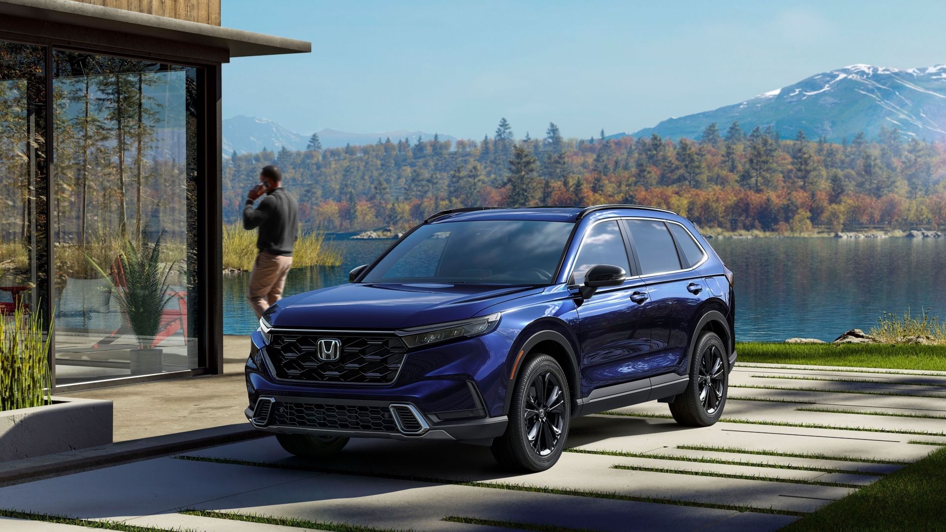 Foto frontal 3/4 de um Honda CR-V Sport Touring 2023