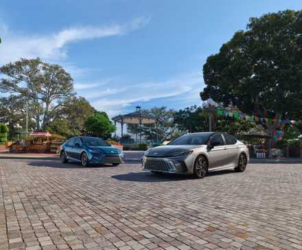 Front 3/4 shot of two 2025 Toyota Camrys parked side by side