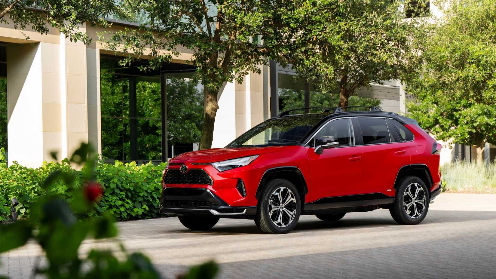 2025 Toyota RAV4 PHEV Prime XSE in a vivid red finish