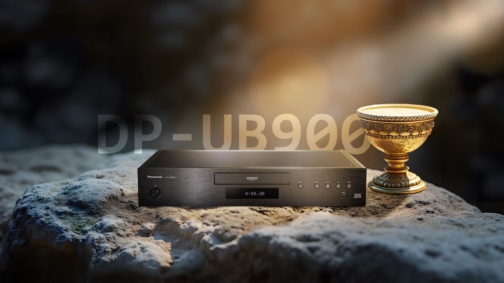 A Blu-ray player on a rock with a chalice beside it.
