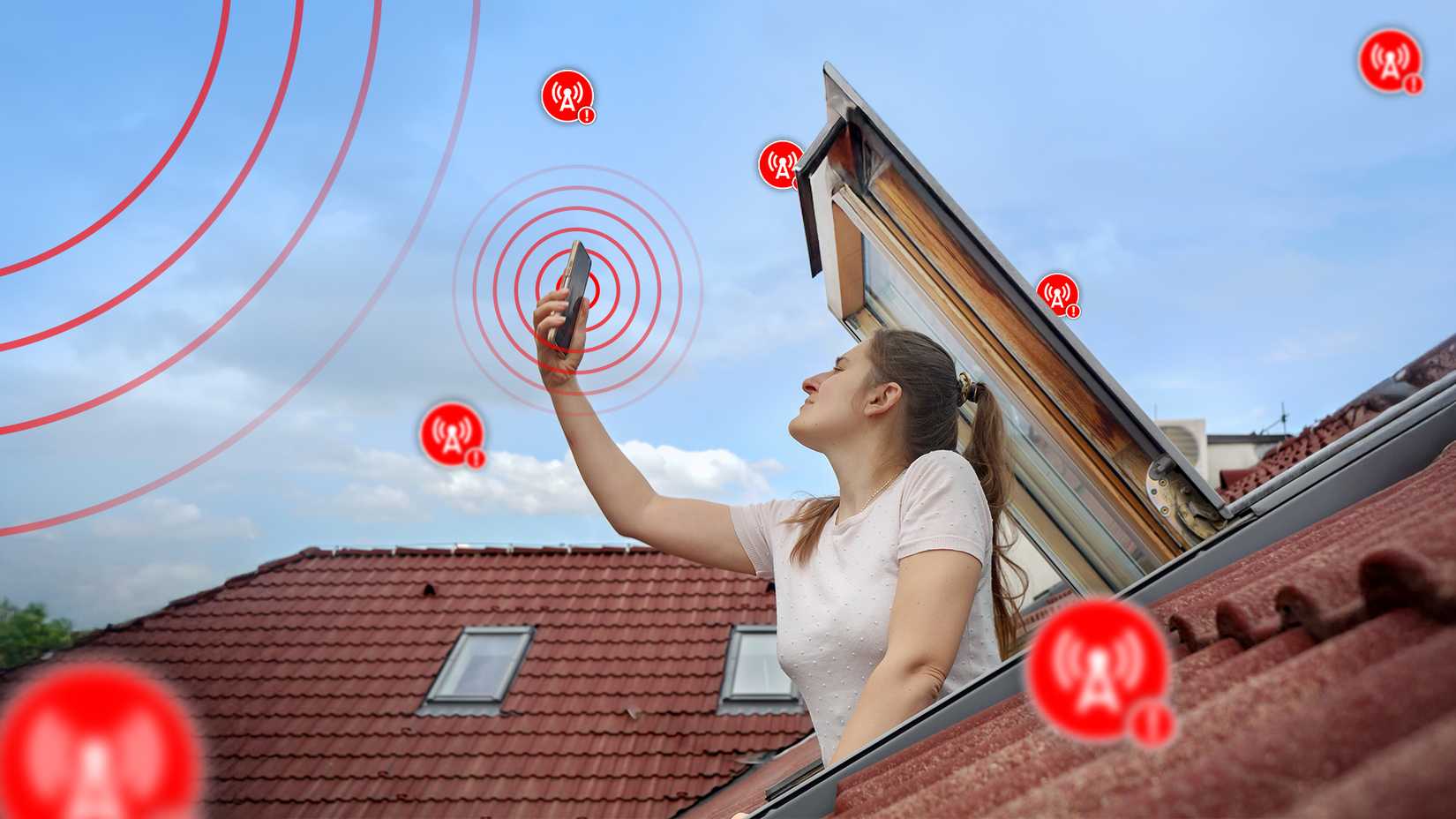 A woman at the attic window trying to get a cell phone signal.