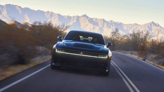 Head-on action shot of a 2025 Dodge Charger Daytona