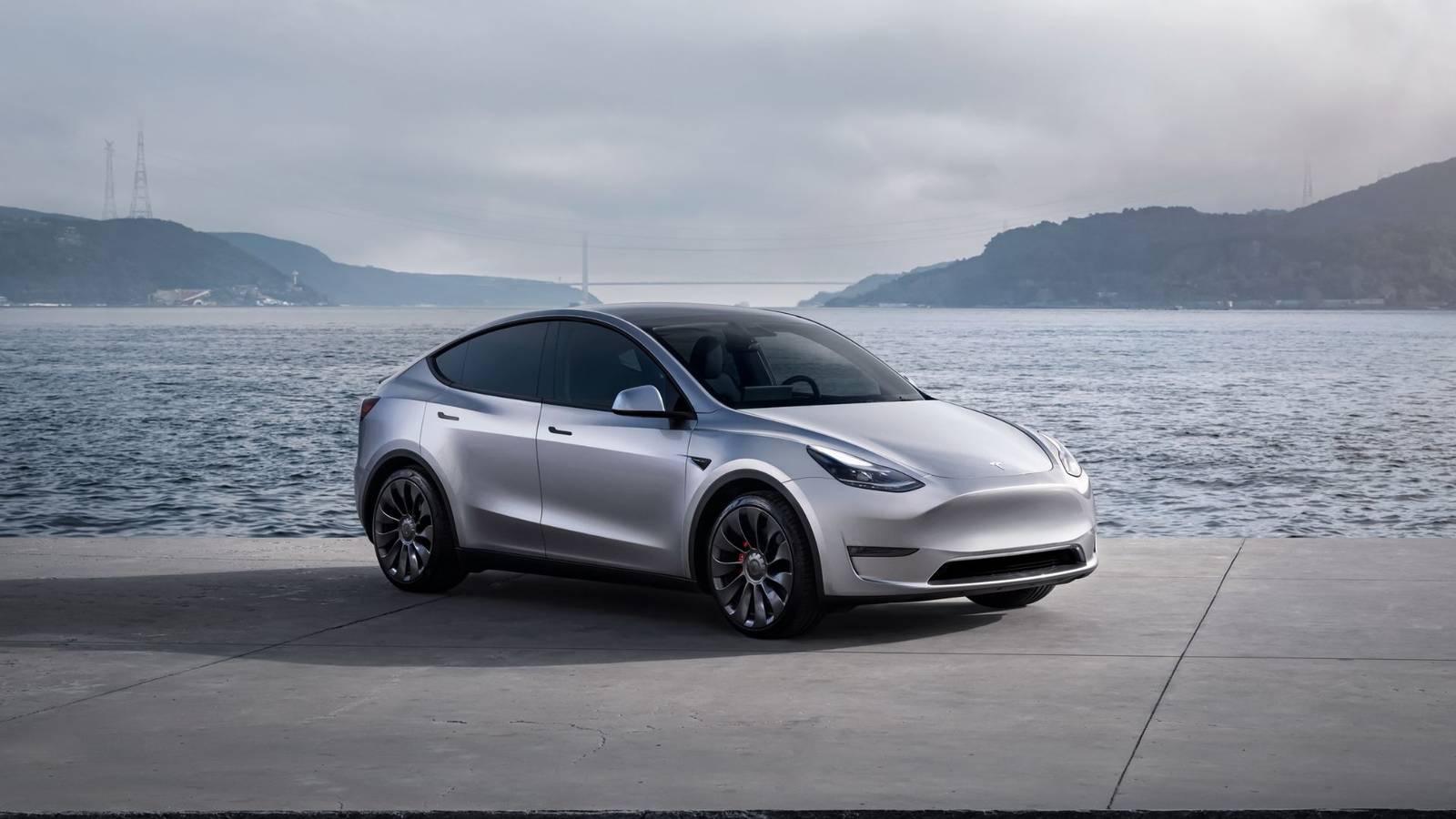 A used EV in a real-world setting illustrating how battery health and range matter for daily driving and road trips