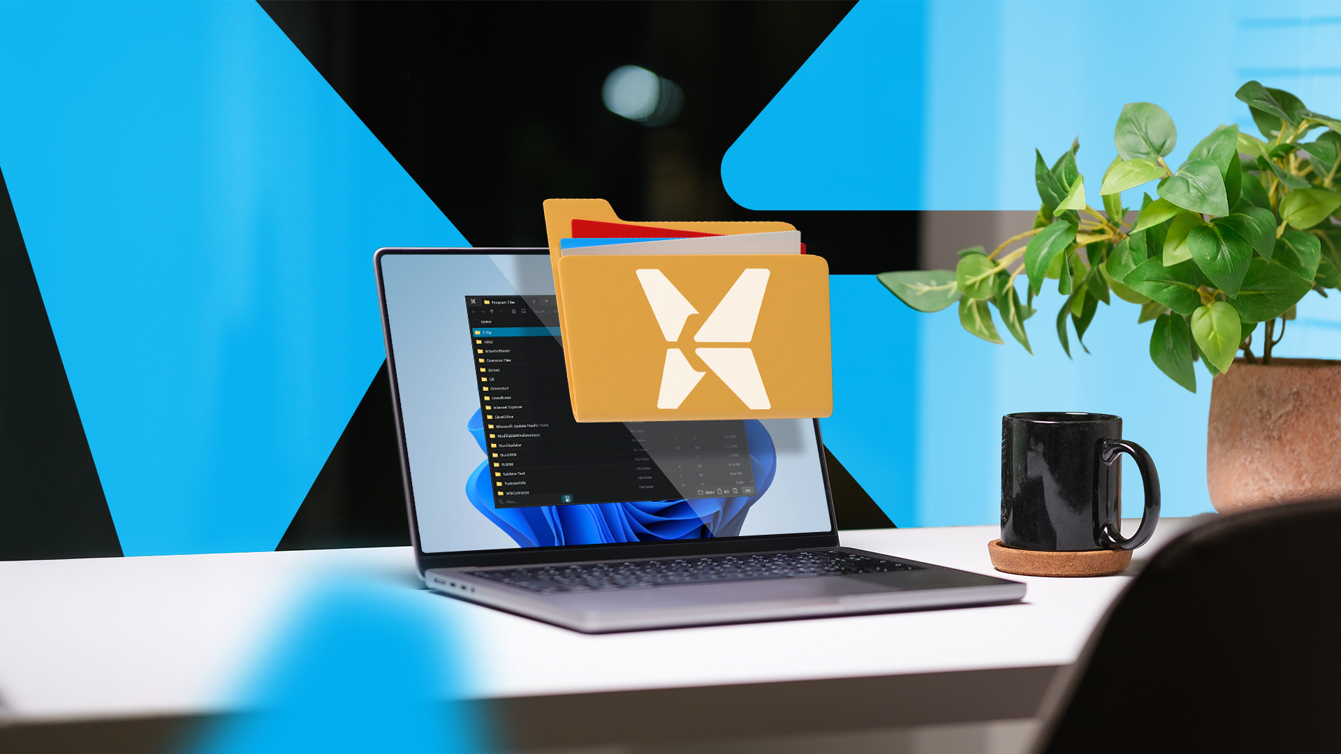 A laptop on a table with a folder icon in front of its screen.