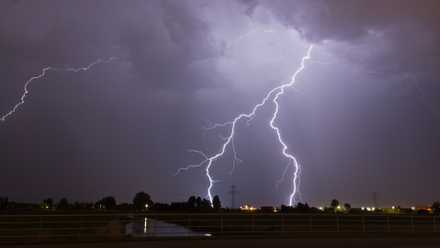 A lightning strike in an urban area.