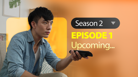 A man holding a TV remote with an upcoming episode notification beside him.