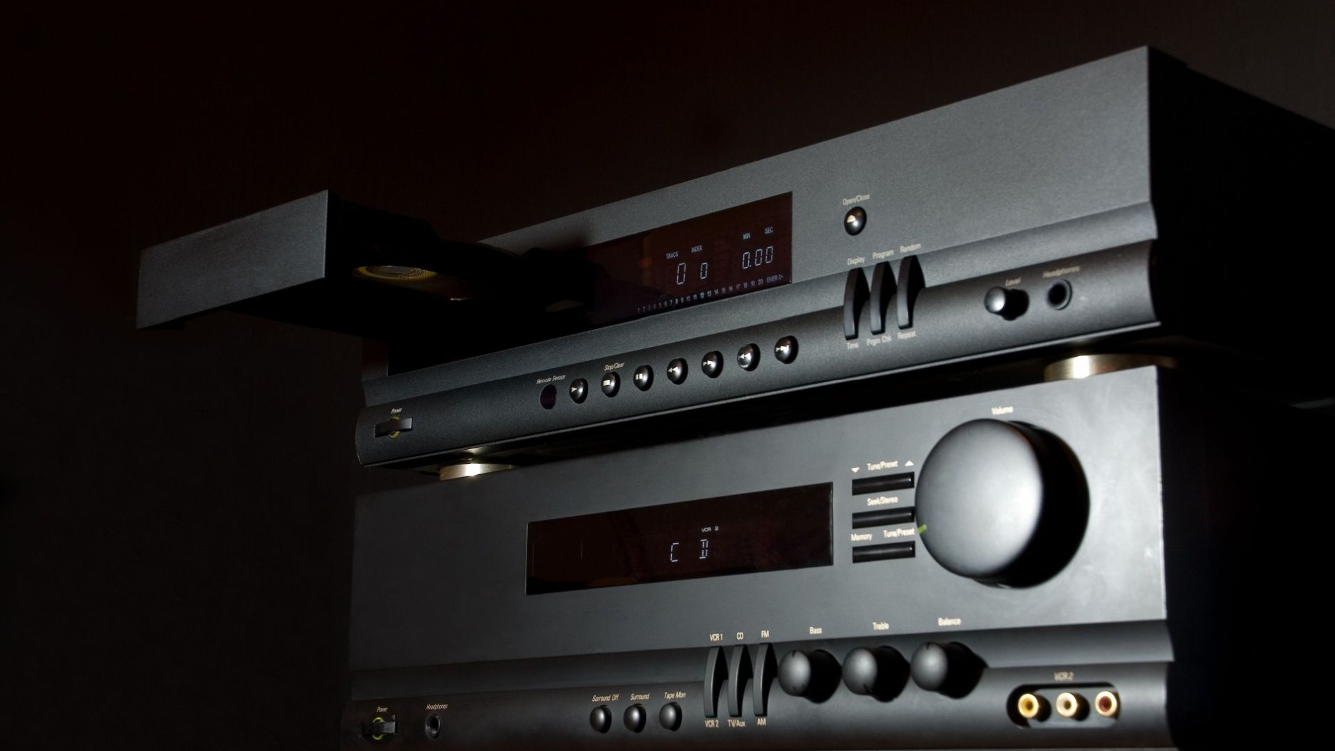 A Hi-Fi audio system close up in moody lighting.