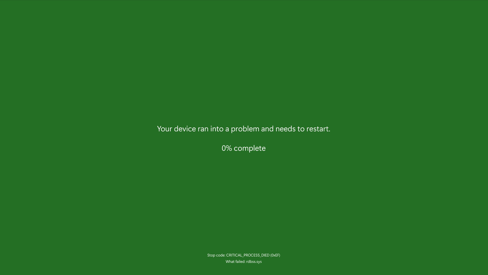 Uma tela verde sólida exibe uma mensagem sobre um erro do dispositivo e reinicia com um indicador de progresso em 0%.