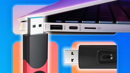 USB ports of a laptop and two USB drives.