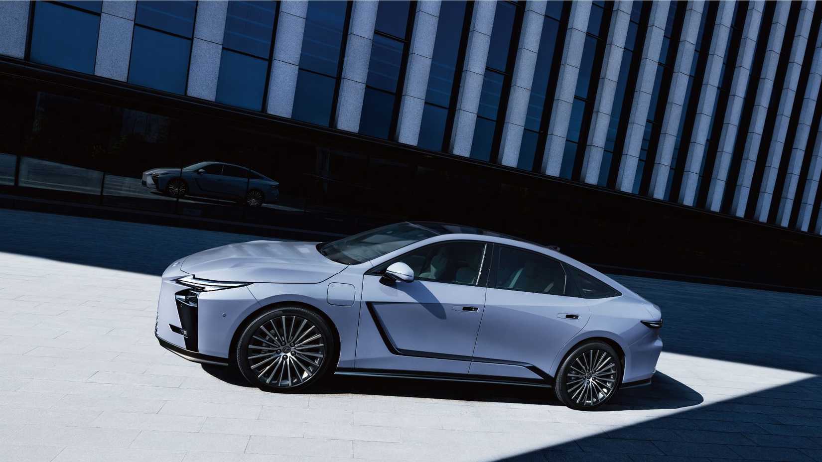 Side profile shot of the 2026 Lexus ES parked in the shadows.