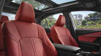 Close-up shot of the red leather seats inside a 2025 Toyota Camry XSE.
