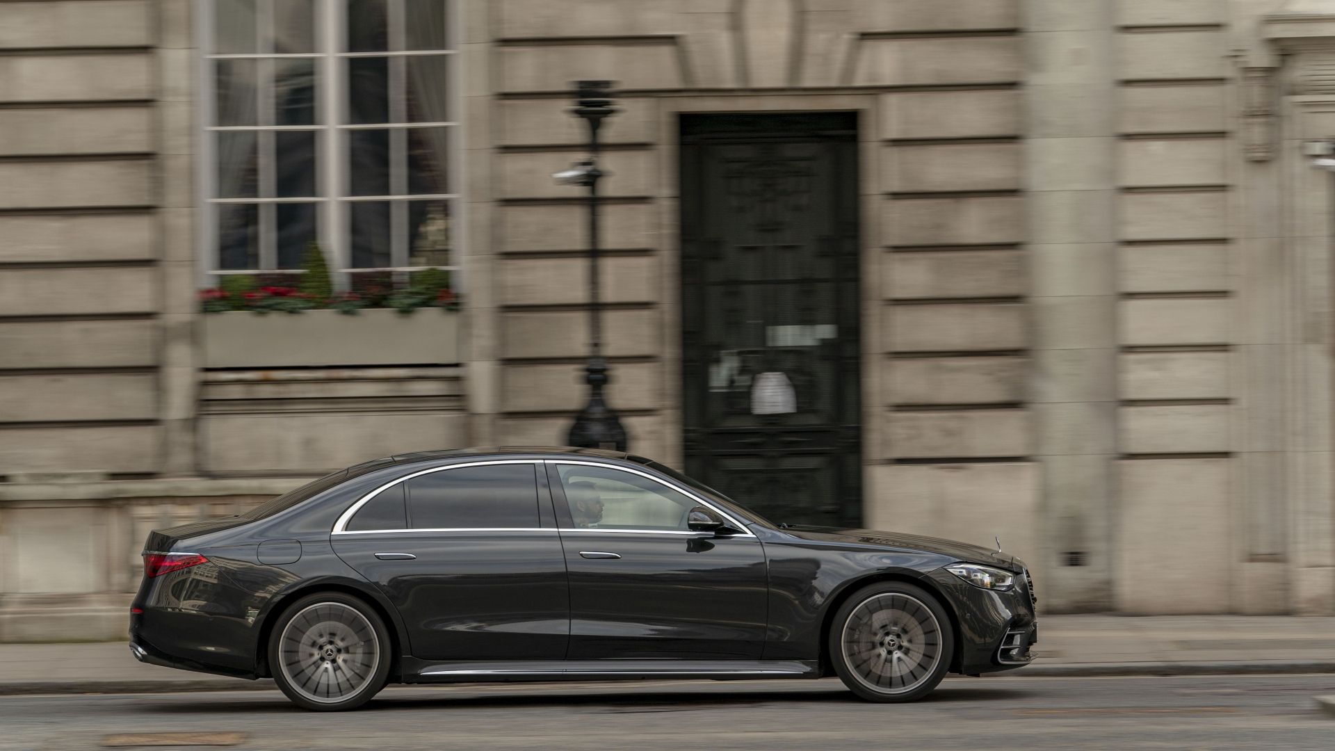Side profile action shot of a 2025 Mercedes-Benz S-Class