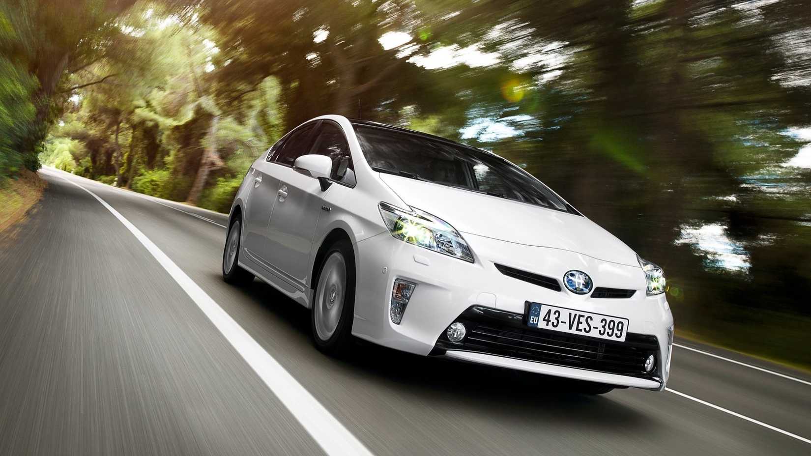 Front 3/4 action shot of a 2012 Toyota Prius