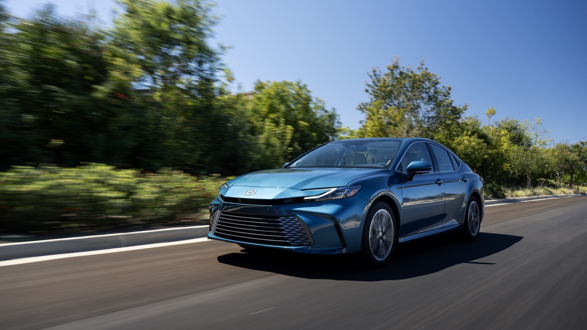 Front 3/4 action shot of a 2025 Toyota Camry