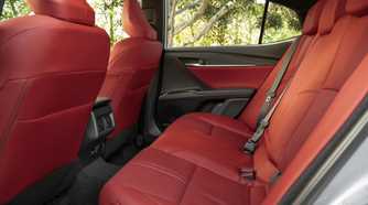 Shot of the rear seats in a 2026 Toyota Camry XSE AWD with red leather.