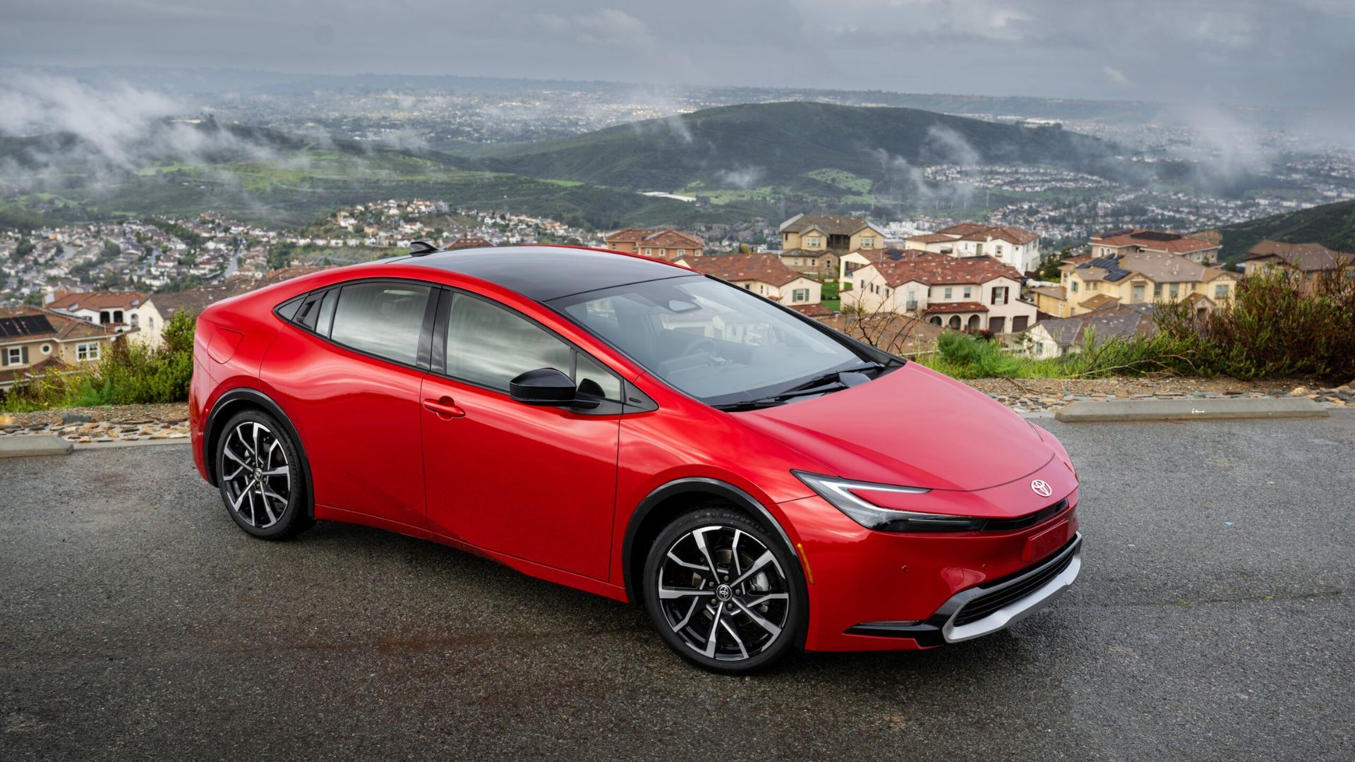The 2025 Prius Prime XSE in Supersonic Red offers plug-in hybrid efficiency on regular fuel