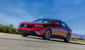 Front 3/4 action shot of a 2023 Honda Accord