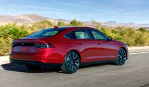 Rear 3/4 action shot of a 2023 Honda Accord