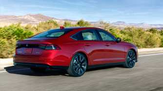Rear 3/4 action shot of a 2023 Honda Accord