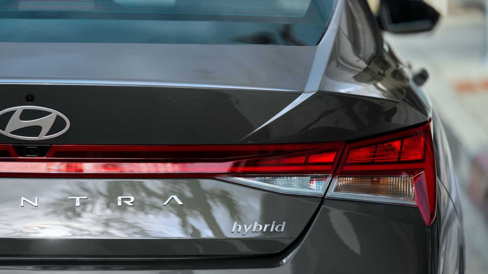 Static rear-end shot of a gray 2025 Hyundai Elantra Hybrid.