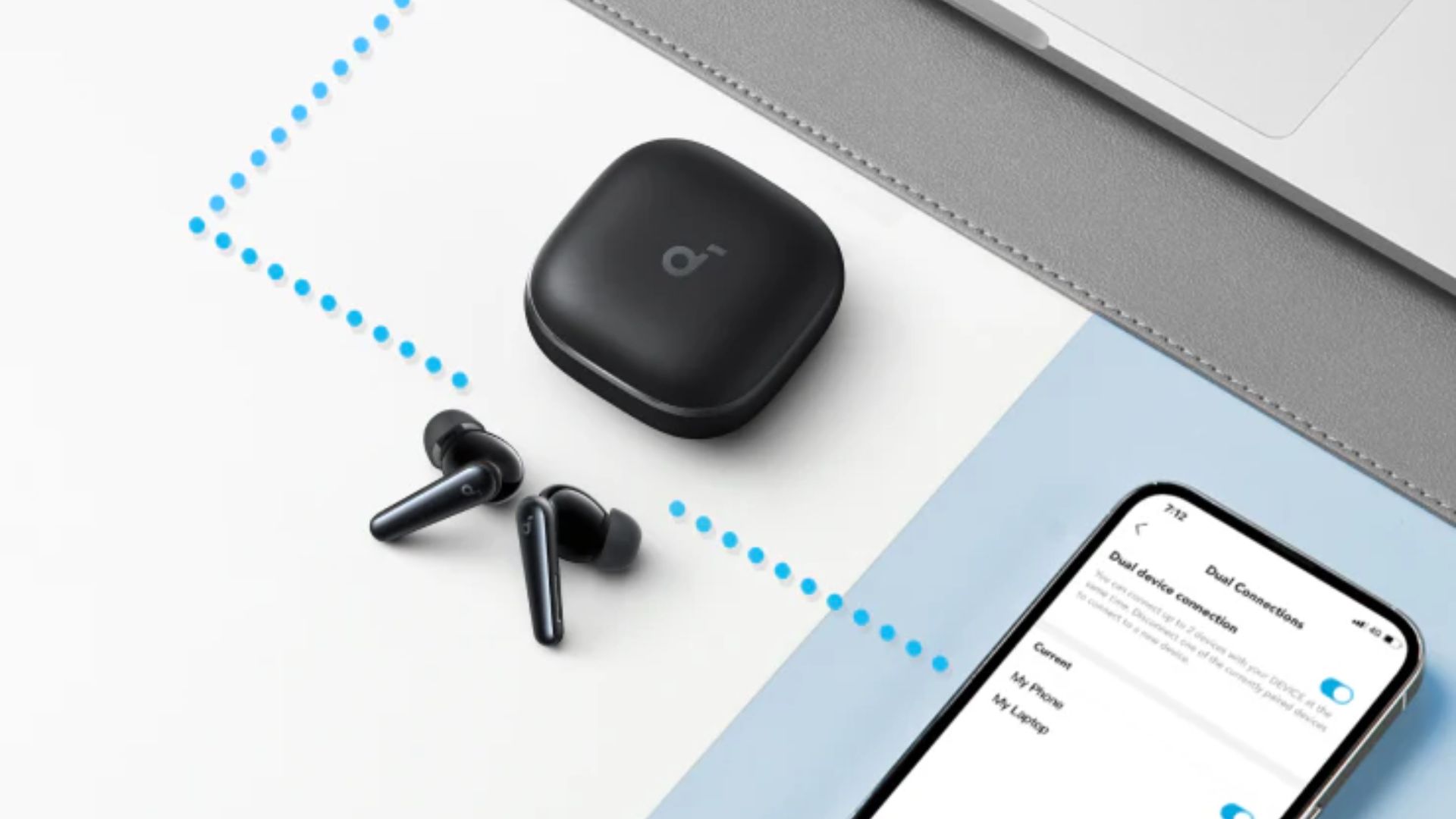 Anker soundcore liberty 5 earbuds and a phone. 