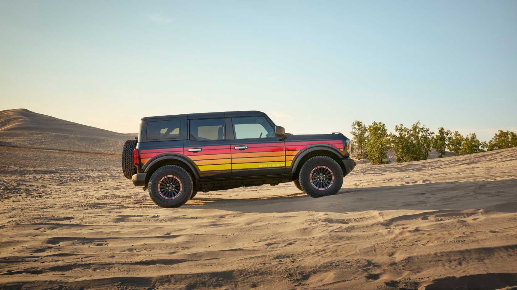 Static side profile shot of a 2025 Ford Bronco Free Wheeling in the desert.
