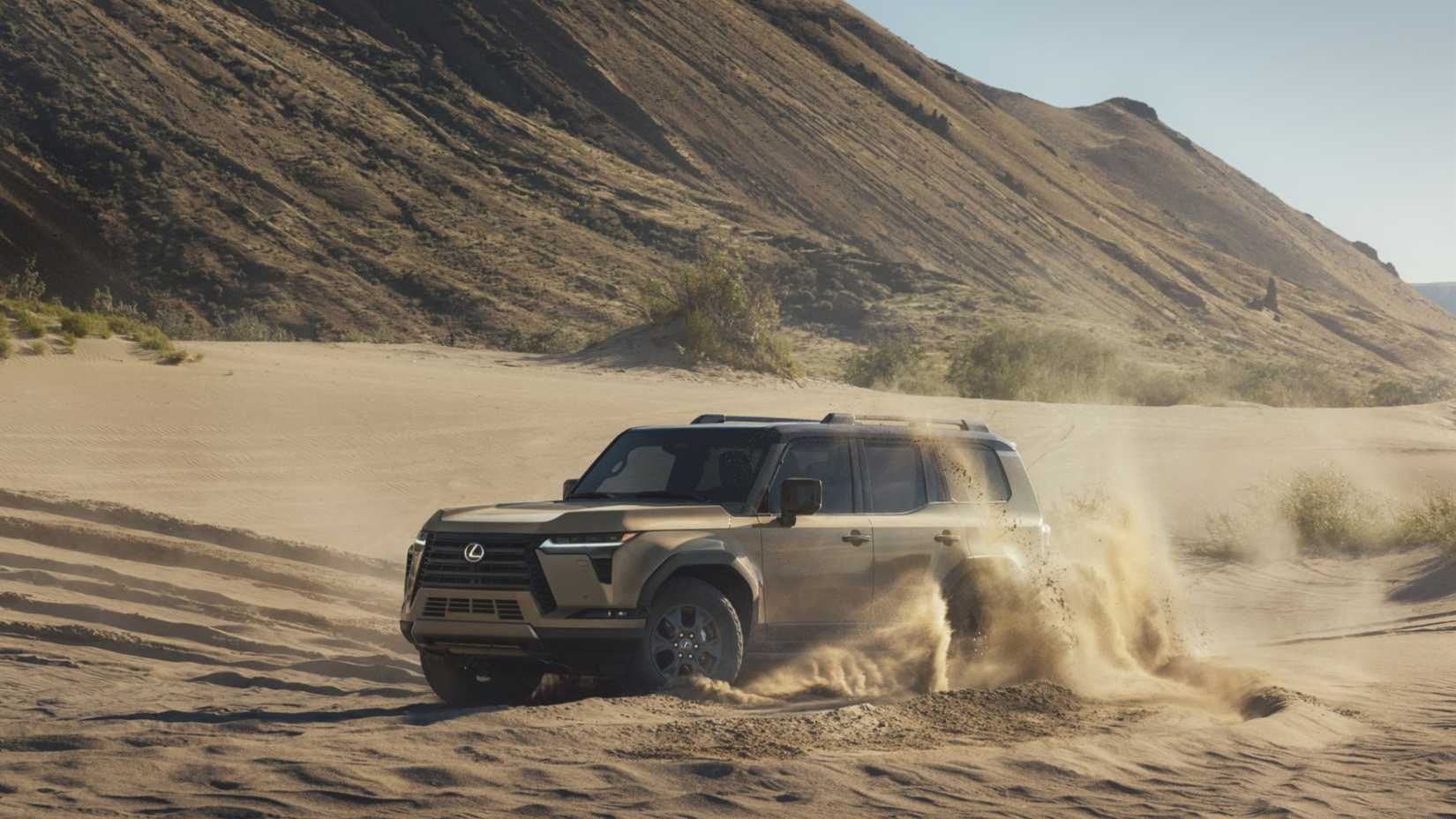 Front 3/4 action shot of a 2025 Lexus GX