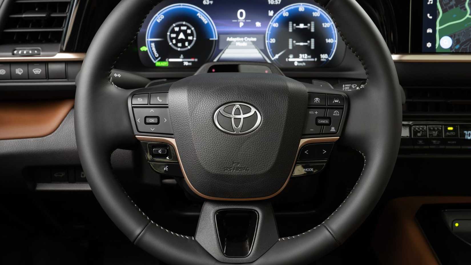 Close-up of the steering wheel and digital instrument panel of the 2025 Toyota Crown Signia Limited.
