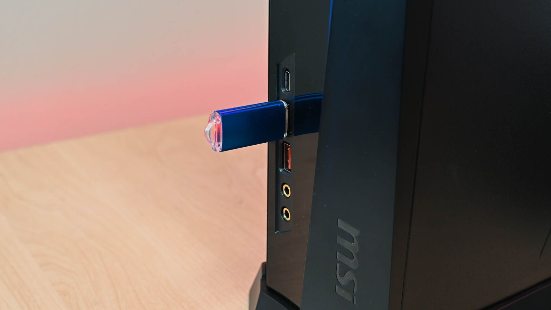 A USB-C port on the front of an MSI PC. 