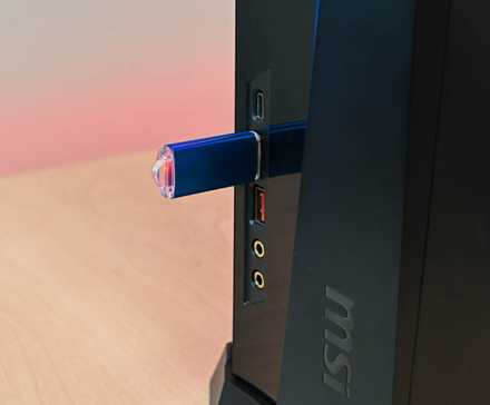 A USB-C port on the front of an MSI PC.