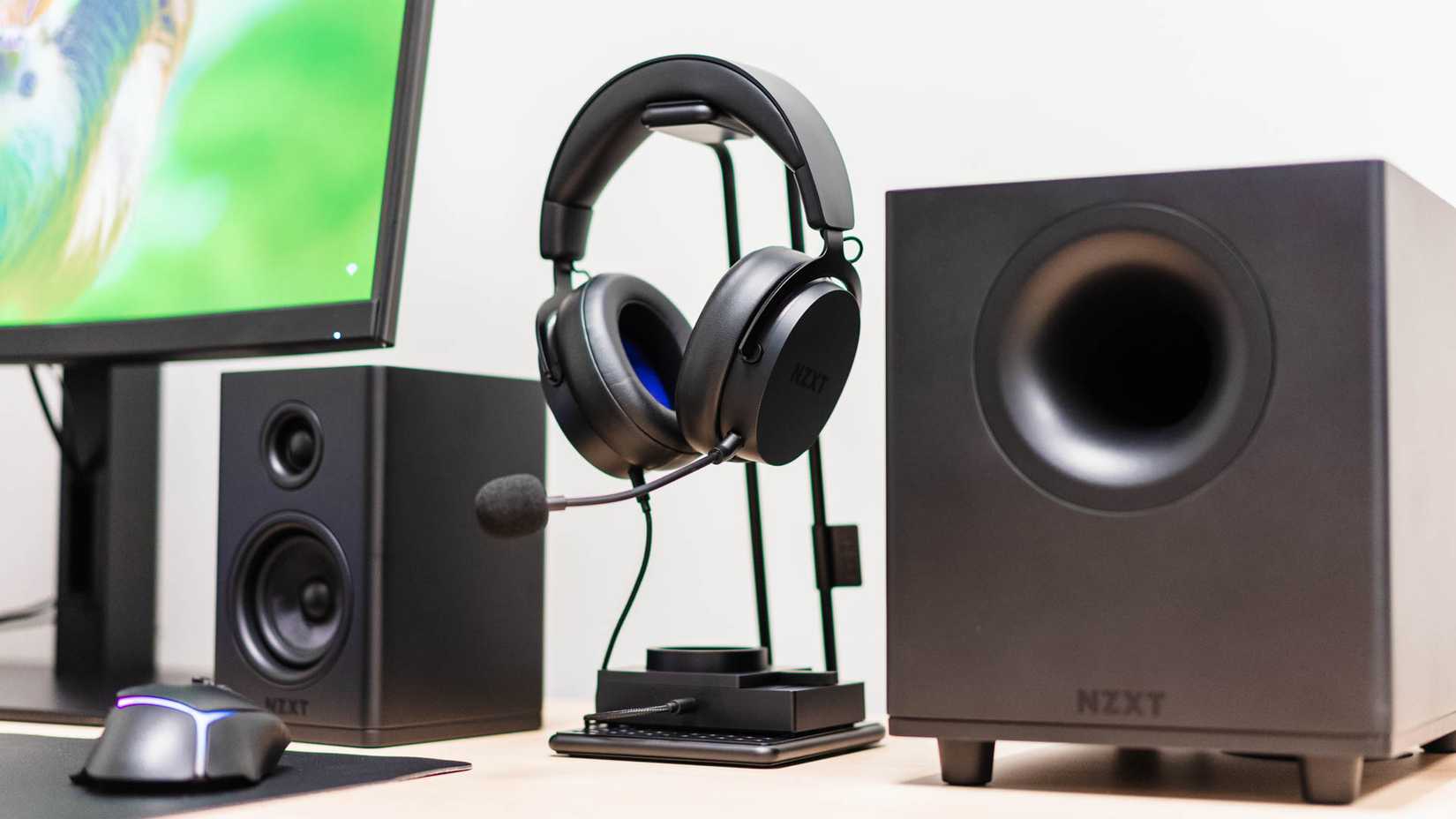 A pair of headphones and desktop speakers.